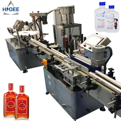 China Automatische GinFüllmaschine mit füllenden und mit einer Kappe bedeckendes Maschinenabfüllenden der Elfewhiskychampagnergingeist-Glasflasche fournisseur